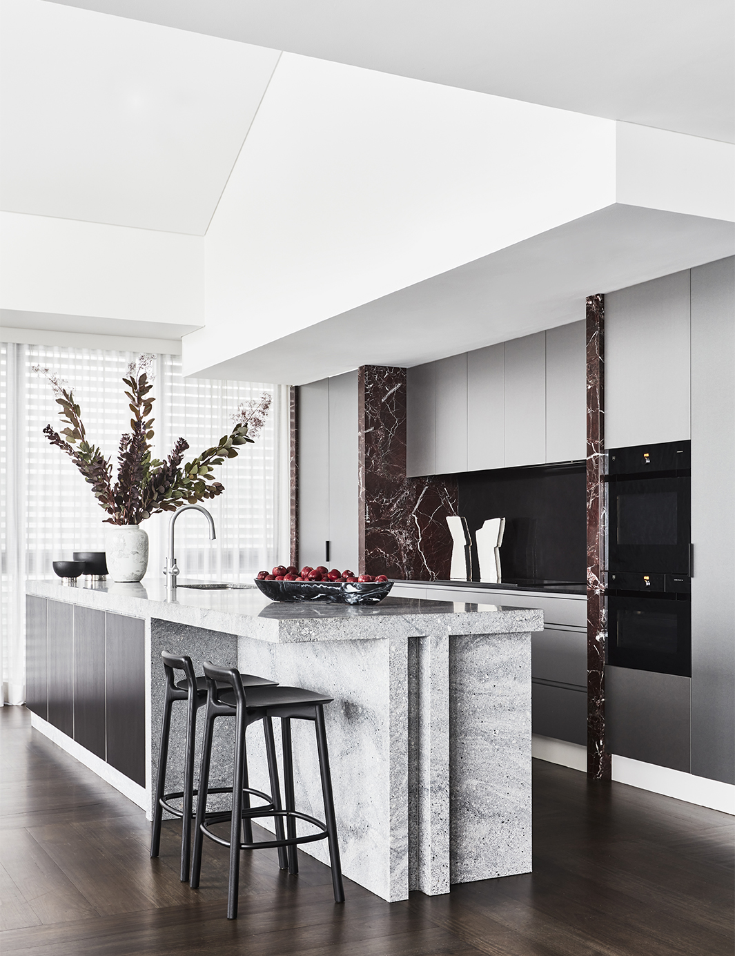 Brendan Wong Design Boardwalk Home Kitchen with grey and red marble features