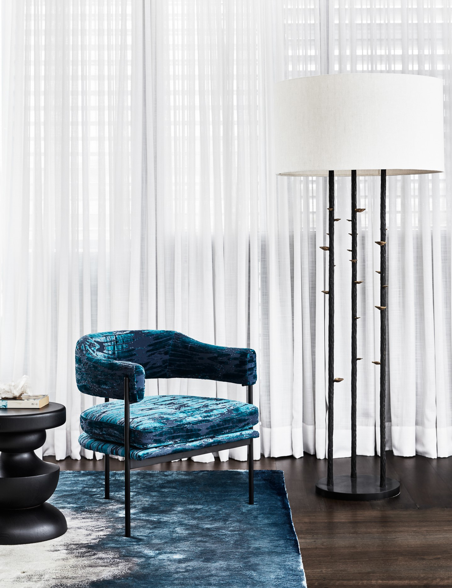 Resident Isabella chair in blue velvet and Rug Establishment custom rug by Sydney interior designers, Brendan Wong Design