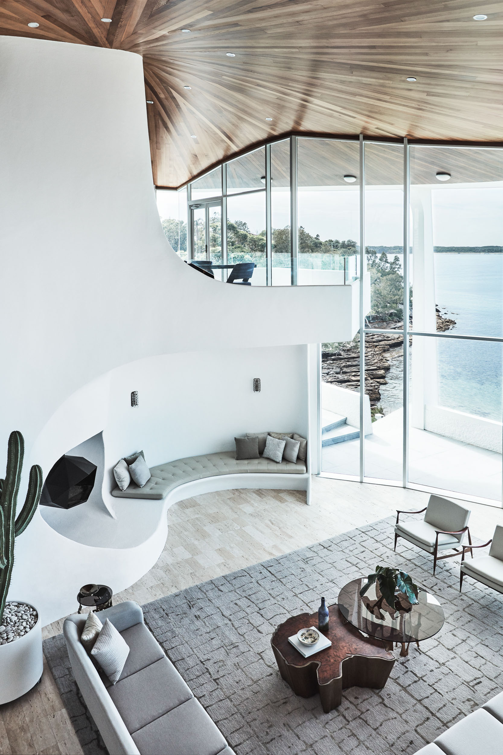 Architectural oceanfront home with furniture in Brazilian Modernism style by Sydney interior designers, Brendan Wong Design