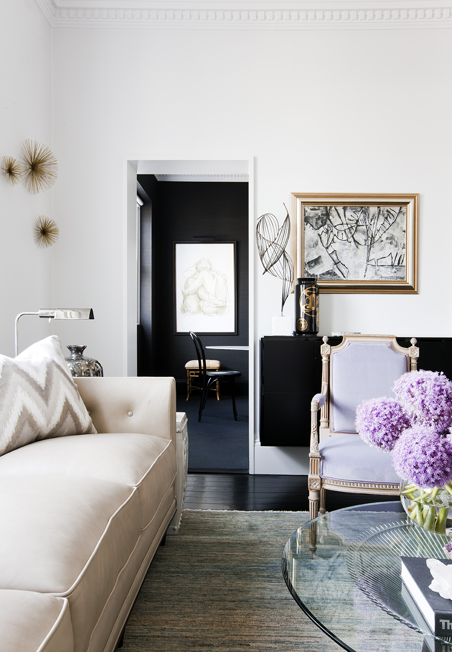 Art Deco heritage apartment living room with antique lilac purple armchair, Curtis Jere sculpture and black Japan floor