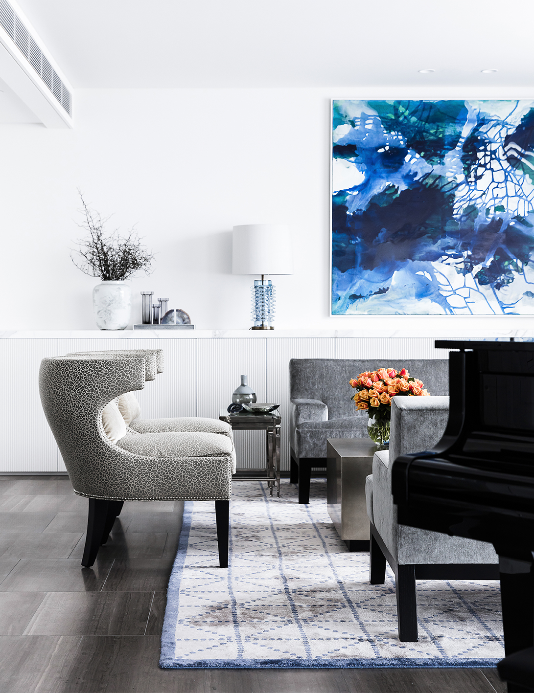 Lounge Room with vibrant blue artwork by Sydney Interior Designer Brendan Wong