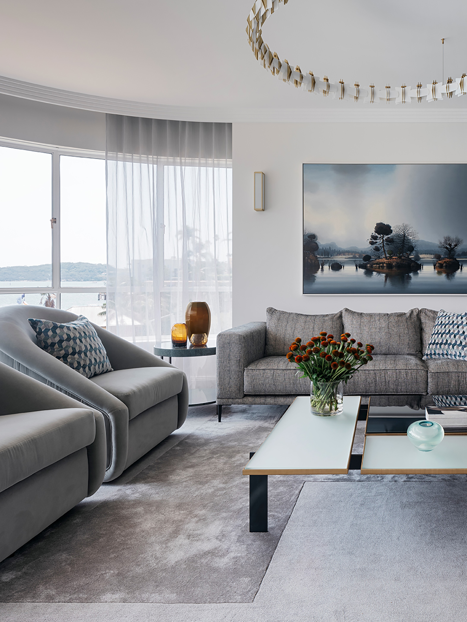 Luxury living room from Sydney Interior designers, Brendan Wong Design, with artwork by artists Alexander McKenzie