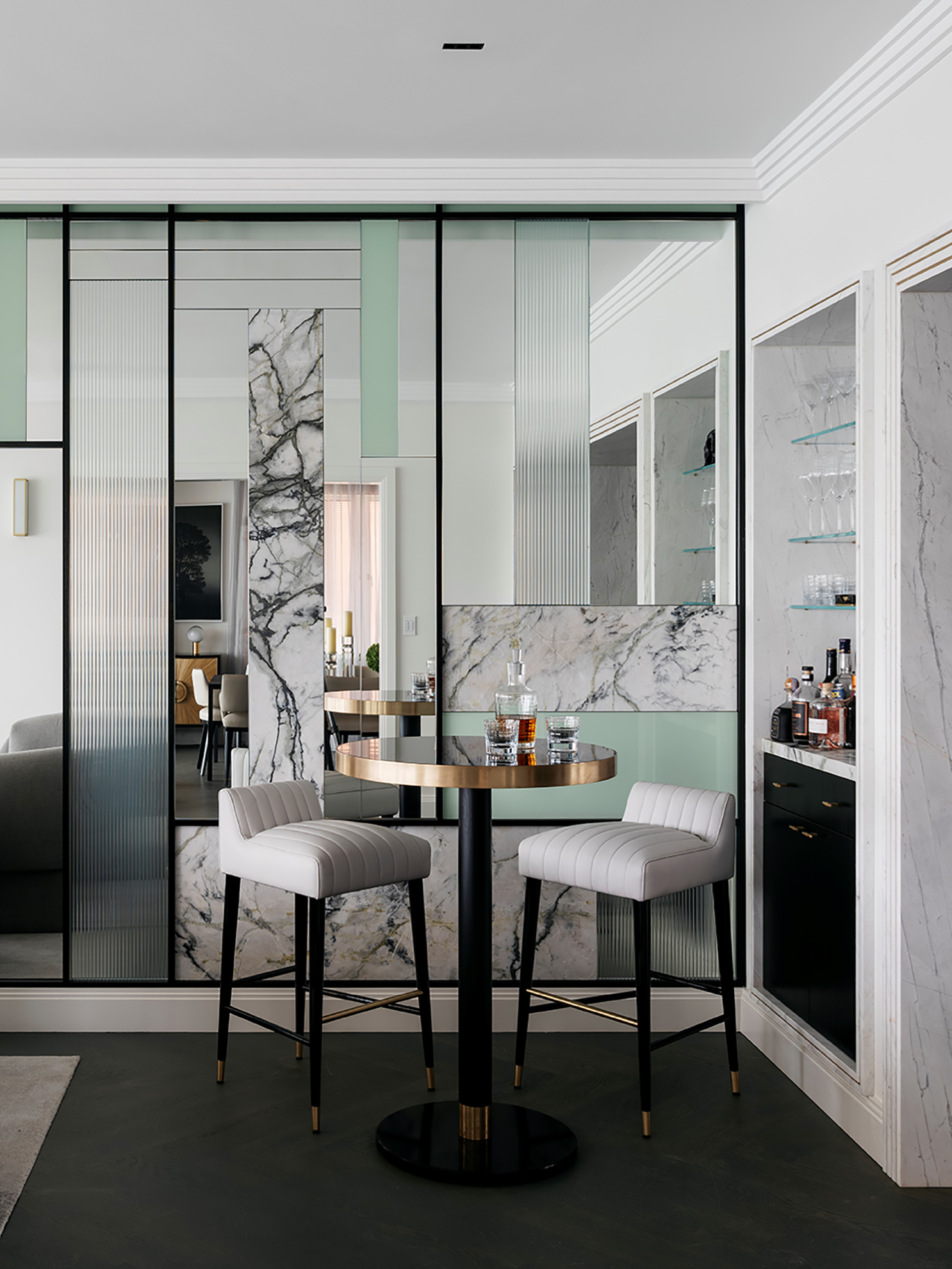 Art deco style home bar renovation with marble architrave and mirror wall, by Sydney interior designers, Brendan Wong Design