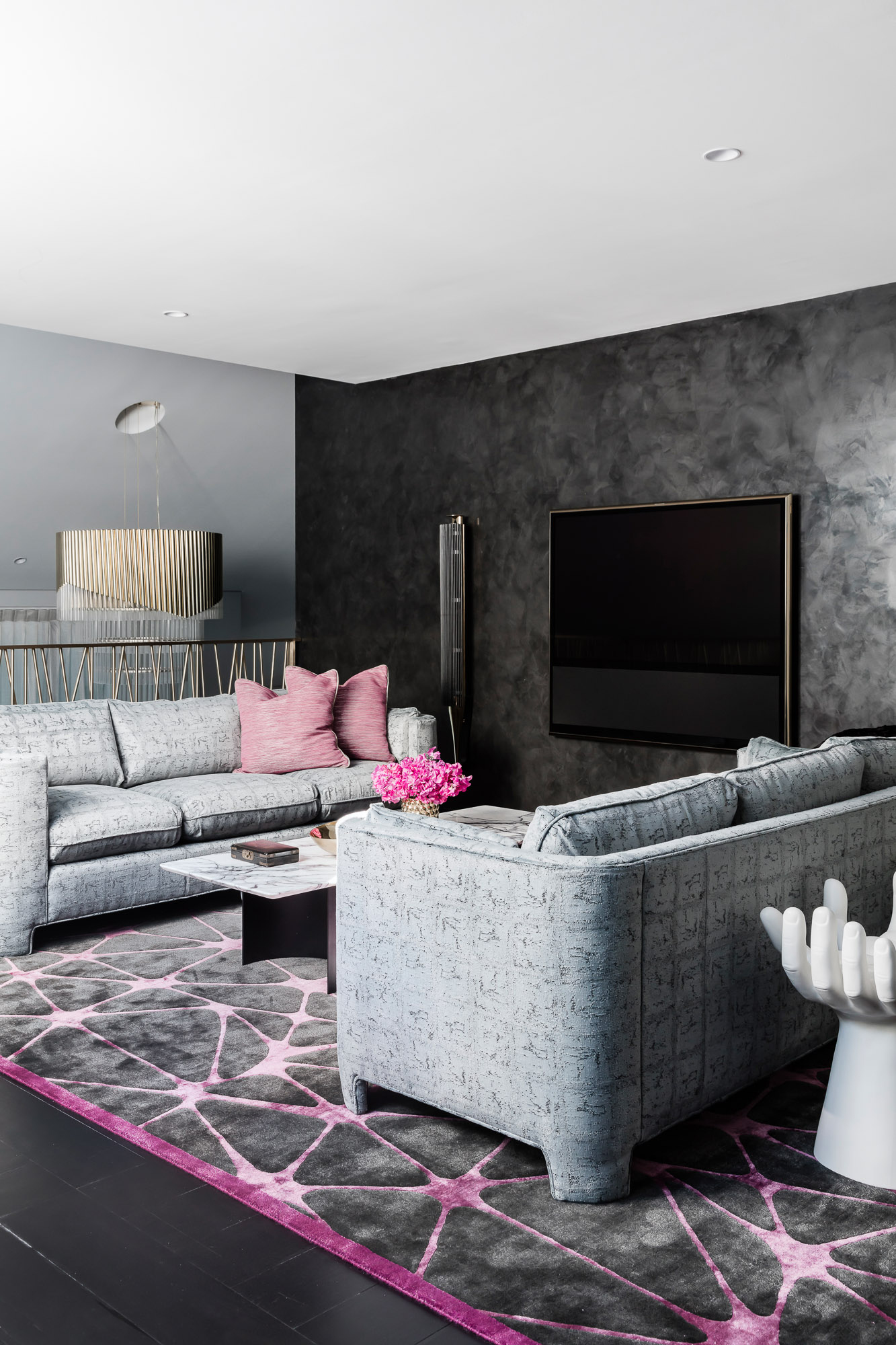 TV room renovation with black venetian plaster wall, Bang & Olufsen sound by Sydney interior designers, Brendan Wong Design